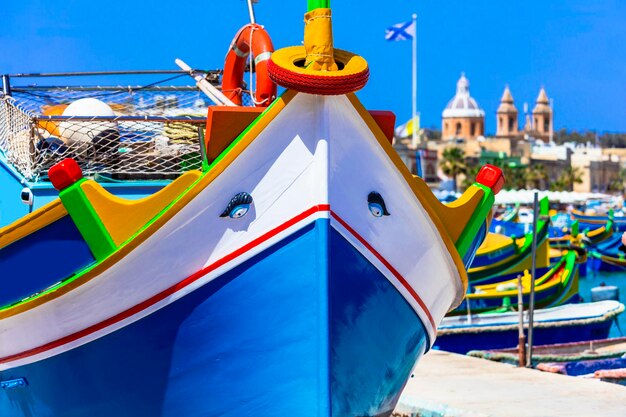 Traditional colorful fishing boats luzzu un Malta