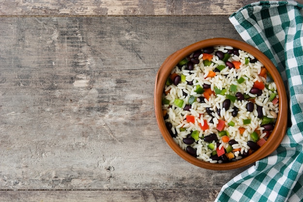 Traditional cuban rice with black beans and pepper