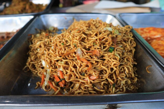 Photo traditional culinary menu of indonesia. indonesian food in a food stall. tasty cuisine of indonesia