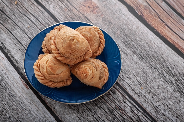 Traditional curry puffs stuffed chicken on plate