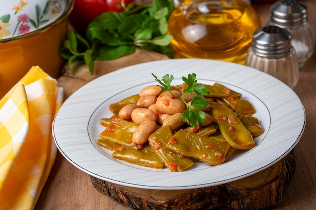 Traditional delicious Turkish food; Green beans with olive oil; Turkish name; Zeytinyagli taze fasulye