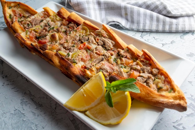 Traditional delicious Turkish food, meat pide (Turkish name; Kusbasi etli pide)