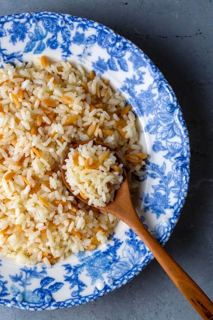 Traditional delicious Turkish food; Turkish style rice pilaf (Turkish name; Arpa sehriyeli pirinc pilavi)