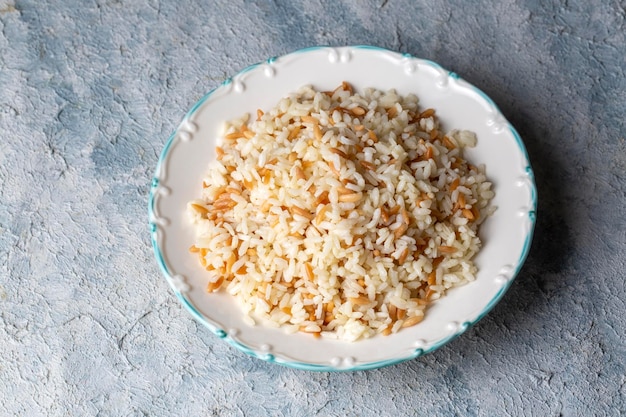 Traditional delicious Turkish food Turkish style rice pilaf Turkish name Arpa sehriyeli pirinc pilavi