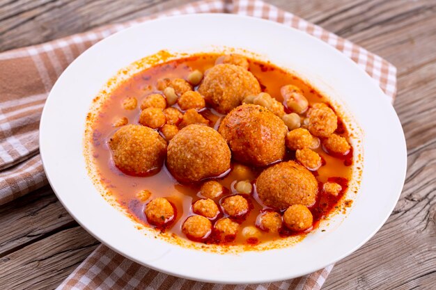 Traditional delicious Turkish foods Bulgur soup Turkish name Anali Kizli icli kofte