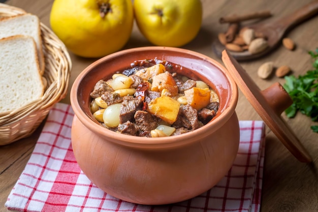 Traditional delicious Turkish foods; Quince and plum lamb stew, lamb tandoori (Turkish name; Ayvali - erikli kuzu guvec - kuzu tandir