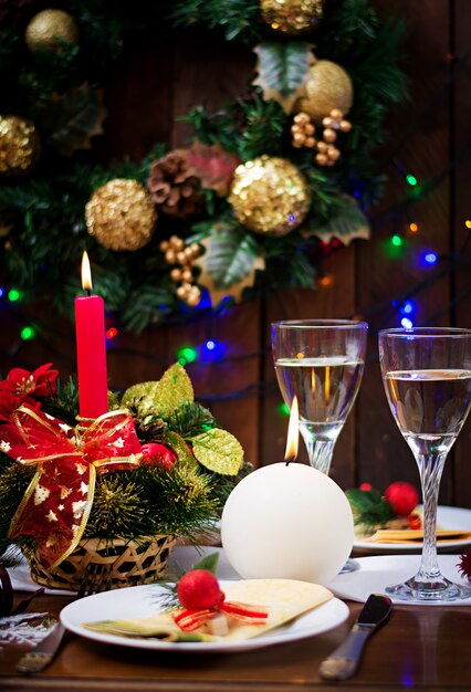 Traditional dishware on Christmas table.