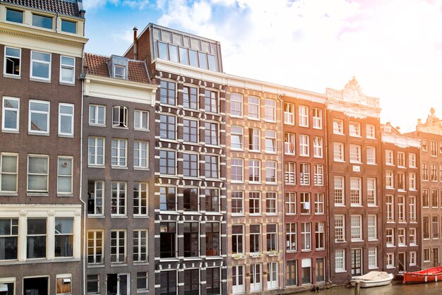 Traditional Dutch architecture on the background of a morning blue sky.