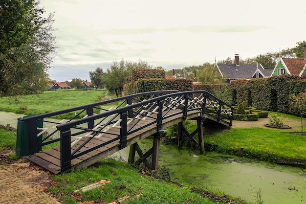 Traditional Dutch houses and bridge in Zaanse Schans Netherlands September 2017