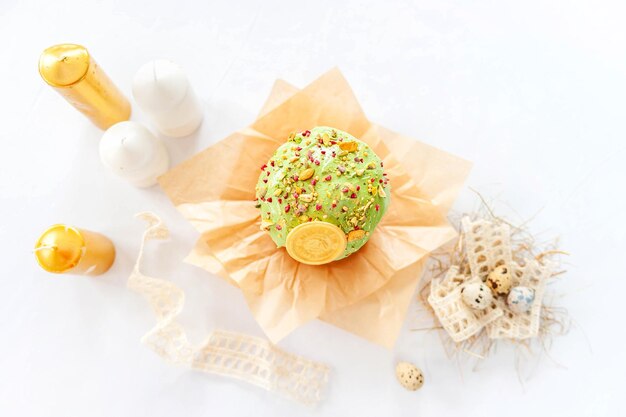 Traditional easter cake or sweet bread quail eggs over white background