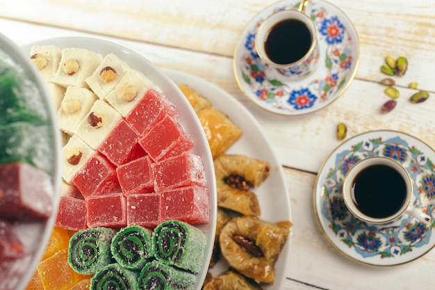 Traditional eastern desserts on wooden background