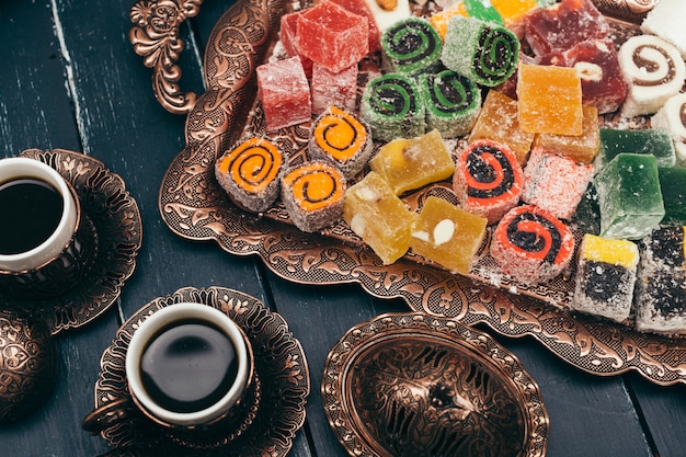  traditional eastern desserts on wooden surface 