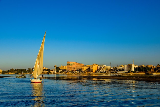 Traditional egyptian vessel felucca on a Nile river in Luxor Egypt