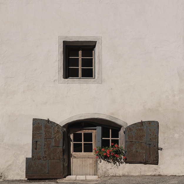 Traditional European old town building Old historic architecture in Italy Sunlight shadows on the wall