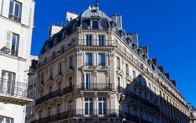 The traditional facade of parisian building france