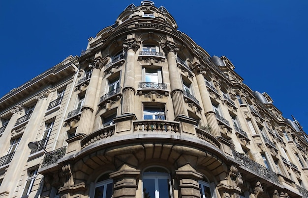 The traditional facade of Parisian building France