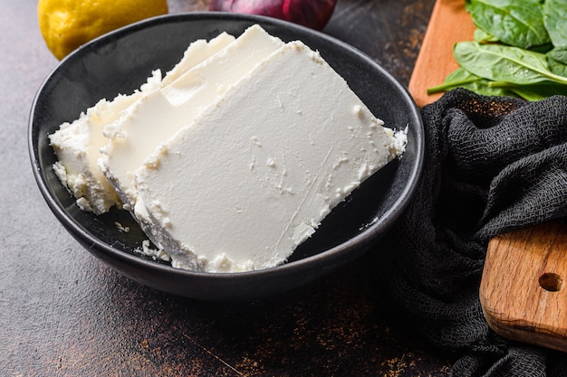 traditional feta cheese in black bowl