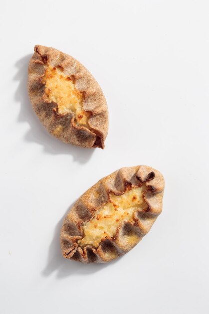 Traditional Finnish pastry Karelian rye pie with rice porridge