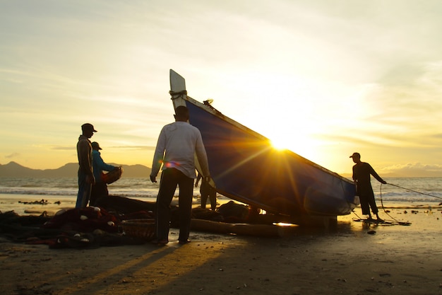 Traditional Fishermen Catch Fish in The Sea