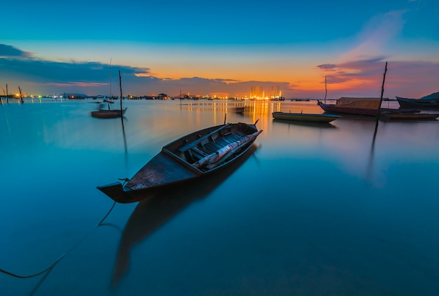 Traditional fishing boat in a fishing village at sunset on Batam island