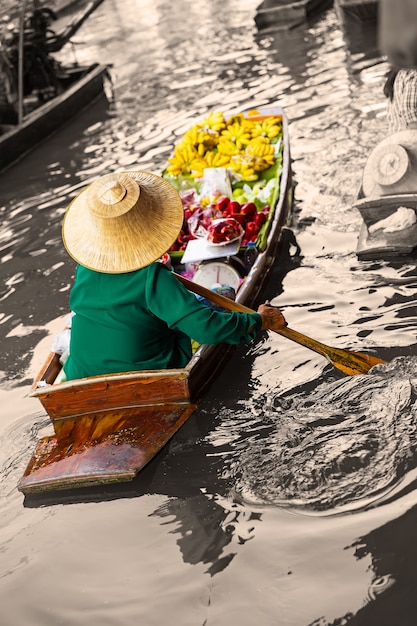 Traditional floating market in Damnoen Saduak near Bangkok