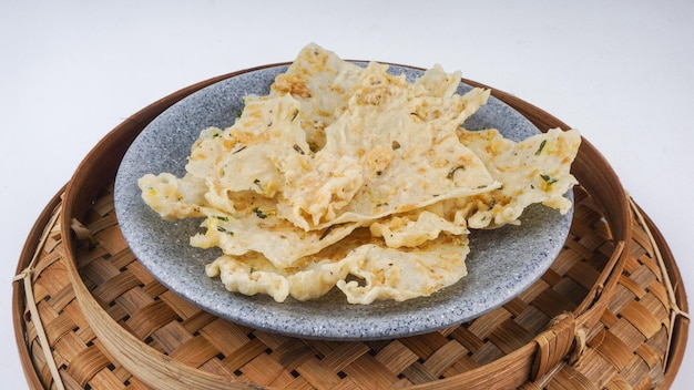 Traditional food from Indonesia known as Rempeyek Rempeyek is fried rice flour mixed with water to form a thick mixture Peanut brittle with fish fillings selective focus