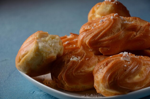 Traditional french dessert eclair with custard