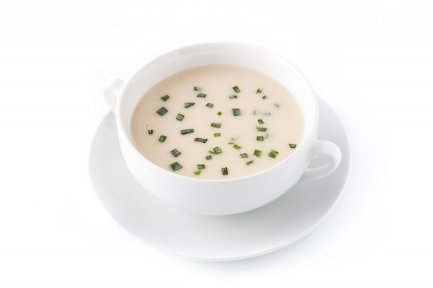 Traditional French vichyssoise soup isolated on white