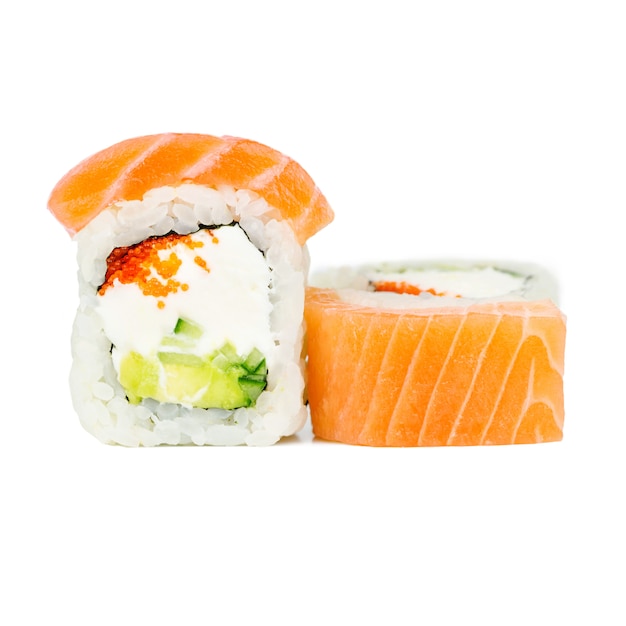 Traditional fresh japanese roll with salmon, nori, philadelphia, tobico, avocado and cucumber