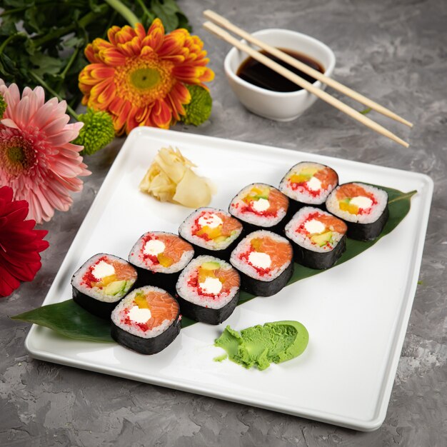 Traditional fresh Japanese sushi rolls with salmon