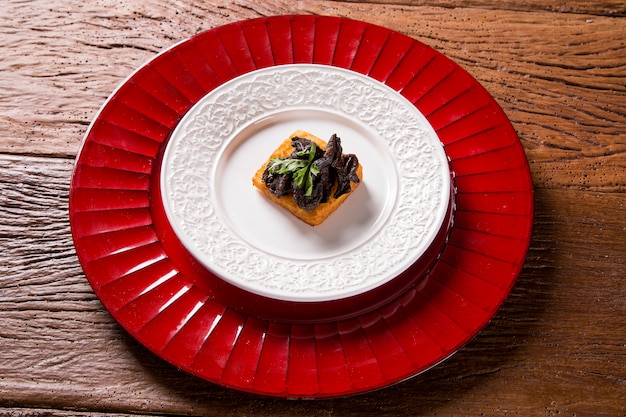 Traditional fried polenta with shitake