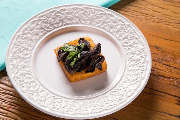 Polenta fritta tradizionale con shitake