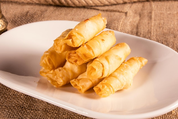 traditional fried turkish patty with cheese on wicker background