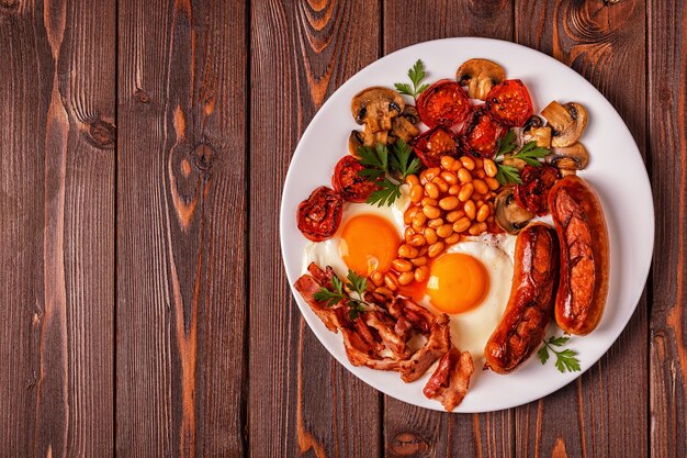 Traditional full English breakfast with fried eggs