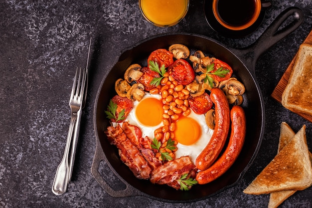 Traditional full English breakfast with fried eggs