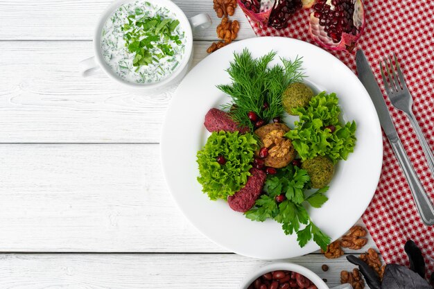 Traditional Georgian dish appetizer Phali served with salad leaves