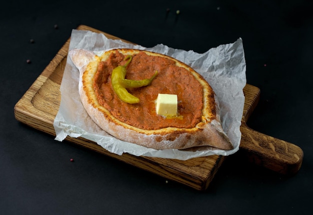 Traditional Georgian pastry khachapuri with cheese and ingredients Georgian cuisine