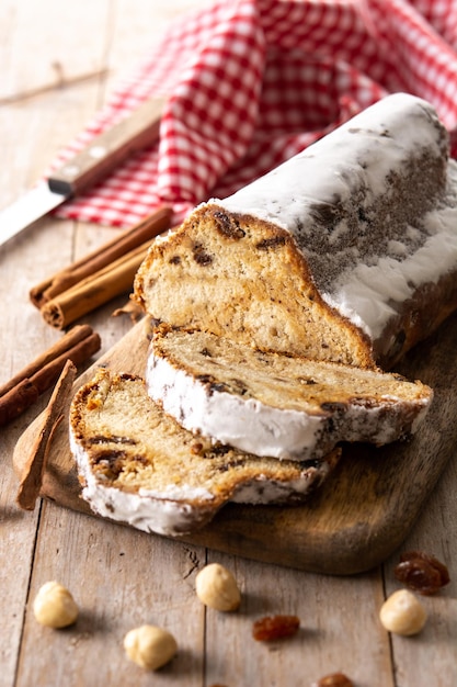 Traditional German Christmas stollen on wooden table