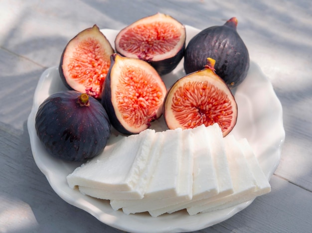 Traditional Greek goat cheese with black figs in a Village in Greece