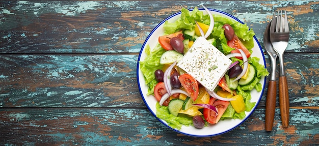 Traditional greek salad with feta cheese tomatoes bell