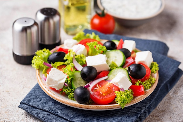 Traditional Greek salad with feta, olives and vegetables