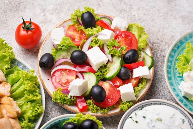 Traditional Greek salad with feta, olives and vegetables