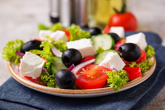 Traditional Greek salad with feta, olives and vegetables