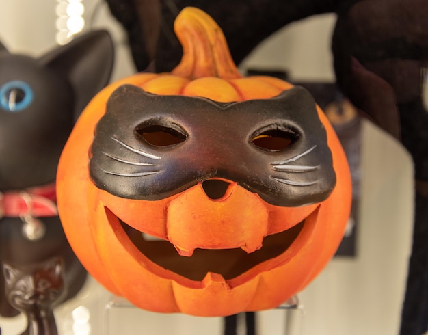 Traditional Halloween carved pumpkin in the shape of a cat head