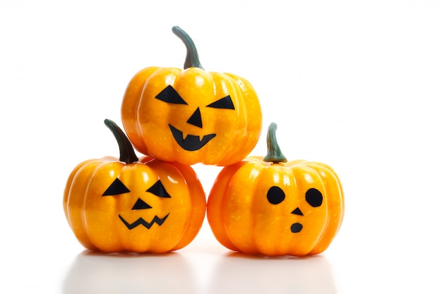 Traditional halloween plastic pumpkins with scary faces