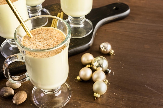 Traditional holiday drink egg nog garnished with nutmeg.