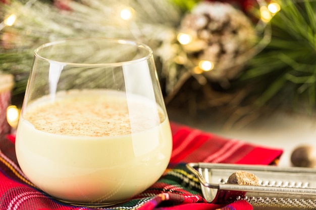 Traditional holiday egg nog garnished with freshly ground nutmeg.