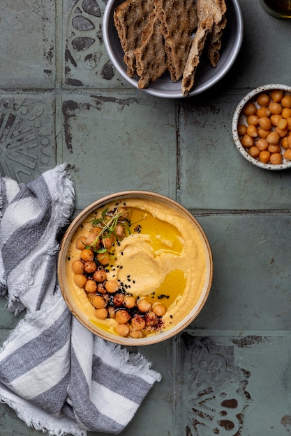 Traditional homemade chickpea hummus with olive oil