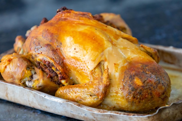 Traditional homemade mayonnaise salad with roasted chicken stuffed with Brazilstyle farofa