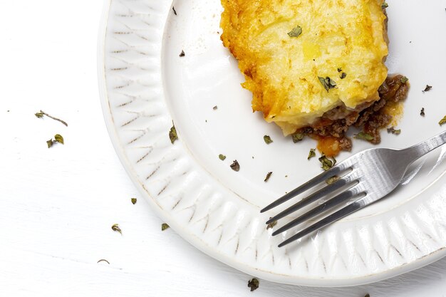 Traditional homemade shepherd pie from above. Cottage foot. English food concept